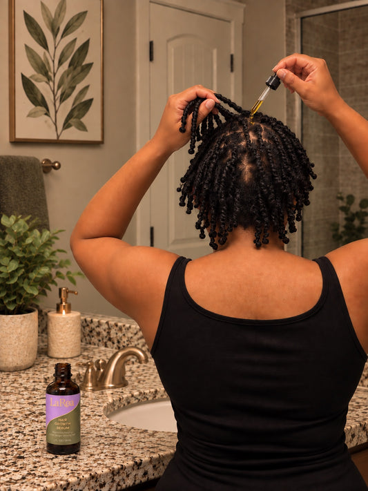 LaRoa serum applied to a parted scalp in a bathroom